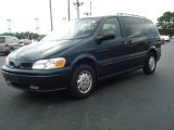 Dark Teal Metallic Oldsmobile Silhouette in 1999