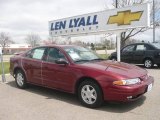 Ruby Red Metallic Oldsmobile Alero in 2003