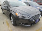 2015 Magnetic Metallic Ford Fusion SE #102884376