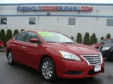 Red Brick Nissan Sentra in 2013