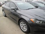 2015 Magnetic Metallic Ford Fusion SE #103279242