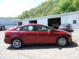 2015 Ruby Red Metallic Ford Focus SE Sedan #103784177