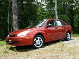 2000 Autumn Orange Metallic Ford Focus SE Sedan #104775200