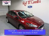 2015 Ruby Red Metallic Ford Focus SE Hatchback #104865088