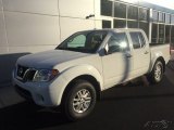 Glacier White Nissan Frontier in 2014