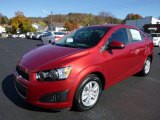 Crystal Red Tintcoat Chevrolet Sonic in 2016