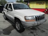 1999 Stone White Jeep Grand Cherokee Laredo #109756943