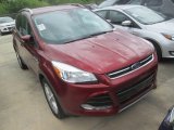 2016 Sunset Metallic Ford Escape Titanium 4WD #113374312