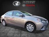 2016 Brown Sugar Metallic Toyota Corolla LE #113687643