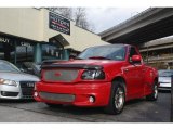 2000 Bright Red Ford F150 SVT Lightning #117290973