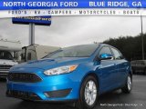 2017 Blue Candy Ford Focus SE Sedan #117792384