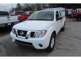 Avalanche White Nissan Frontier in 2012