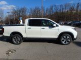 White Diamond Pearl Honda Ridgeline in 2017