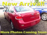 2011 Sangria Red Metallic Ford Focus S Sedan #119603148