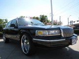 Black Lincoln Town Car in 1997