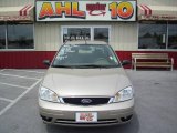 2006 Pueblo Gold Metallic Ford Focus ZX4 SE Sedan #12120071