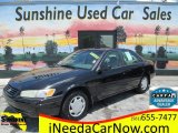 1998 Black Toyota Camry LE #122312543