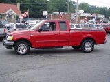 2003 Bright Red Ford F150 XLT SuperCab #12683952