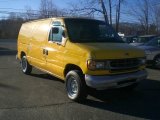 Yellow Ford E Series Van in 1997