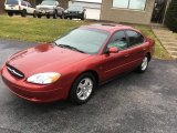 Toreador Red Metallic Ford Taurus in 2001