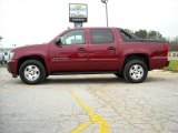 Deep Ruby Red Metallic Chevrolet Avalanche in 2009