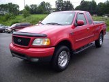 2003 Bright Red Ford F150 XLT SuperCab 4x4 #13367889