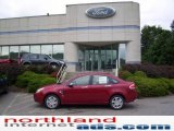 2009 Sangria Red Metallic Ford Focus SEL Sedan #13425054