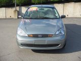 2003 Light Tundra Metallic Ford Focus SE Sedan #13743262