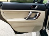 2009 Subaru Outback 2.5XT Limited Wagon Door Panel