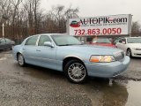 Light Ice Blue Metallic Lincoln Town Car in 2009