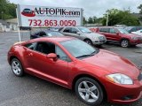2009 Sunset Pearlescent Pearl Mitsubishi Eclipse GS Coupe #139073636