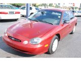 1999 Toreador Red Metallic Ford Taurus LX #13942817