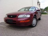 1996 Ruby Pearl Nissan Maxima GXE #13884363