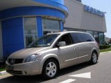 Coral Sand Metallic Nissan Quest in 2004
