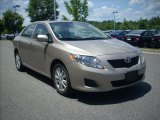 2009 Desert Sand Mica Toyota Corolla LE #13879131