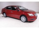 Red Brick Nissan Sentra in 2013