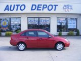 2004 Sangria Red Metallic Ford Focus SE Sedan #14426136