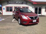 2016 Cayenne Red Nissan Versa SV Sedan #146097868
