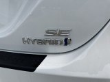2023 Toyota Camry SE Hybrid Marks and Logos