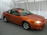 Fusion Orange Metallic Pontiac Grand Am in 2003