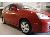 Bright Red Suzuki Aerio in 2002