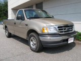 Harvest Gold Metallic Ford F150 in 2000