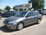 2004 Magnesium Metallic Honda Civic LX Sedan #15625759