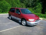 Sunset Red Pearl Nissan Quest in 2001