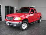 2000 Bright Red Ford F150 XLT Extended Cab 4x4 #16018399