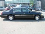 Black Lincoln Town Car in 1998