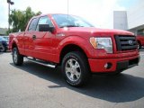 2009 Bright Red Ford F150 STX SuperCab 4x4 #16754945