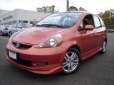 Blaze Orange Metallic Honda Fit in 2007