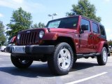 2009 Red Rock Crystal Pearl Jeep Wrangler Unlimited Sahara 4x4 #17406822