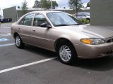 1999 Mocha Frost Metallic Ford Escort SE Sedan #17969648